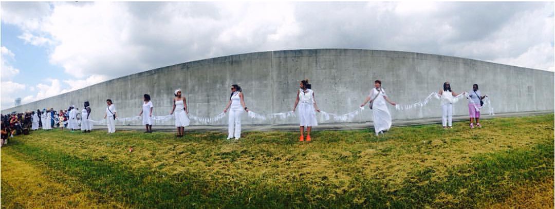 #‎Ecohybridity‬ ‪#‎NOLA‬ Mourning the missing and the lost, and the 100,000 Black folks displaced who haven't been able to make it home. This is the levee that was breached in 2005. Photo by Puck Lo